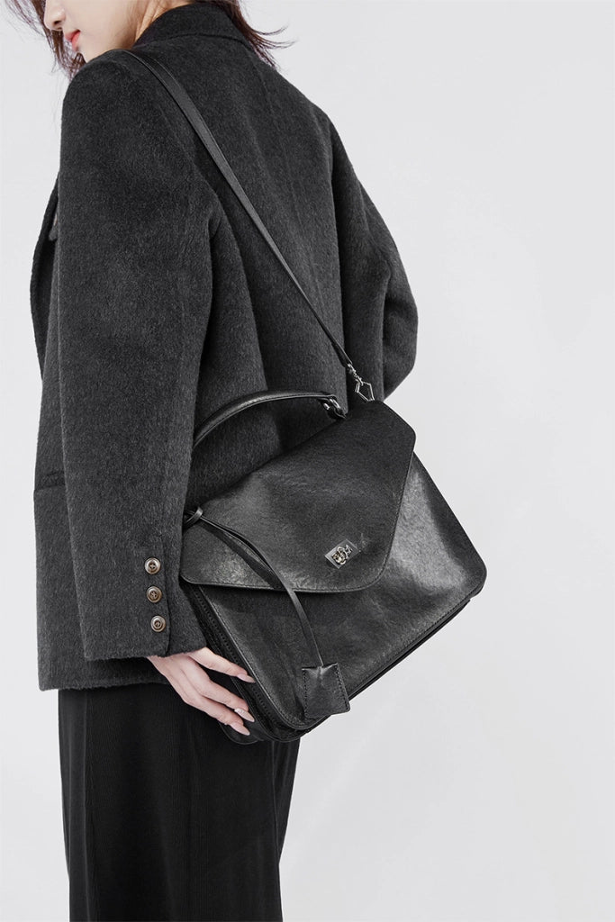 Borsa a mano media da donna in vera pelle, nera.