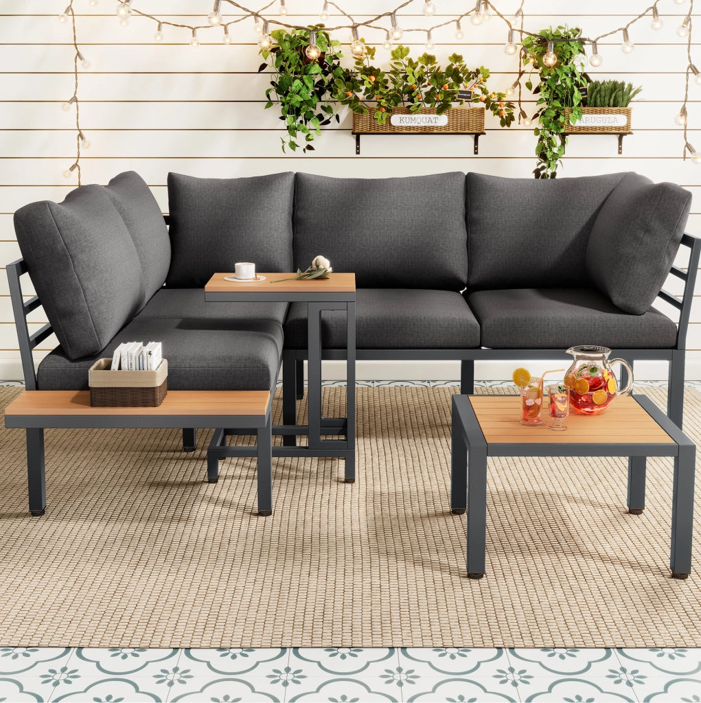 Set da giardino con divano angolare; tavolino laterale e tavolino/poggiapiedi; grigio e nero