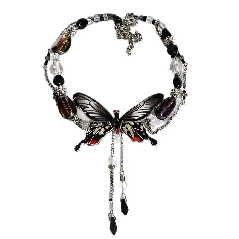Collana con nappa a farfalla nera: gioiello fatto a mano con perline.