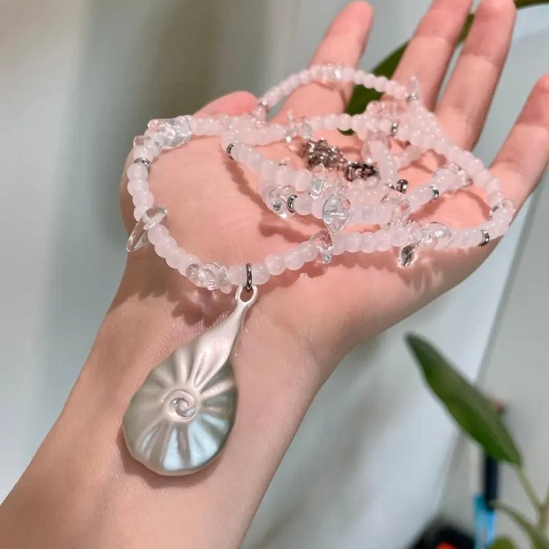 Collana di conchiglie con perline fatta a mano: un regalo vintage con gioielli in cristallo