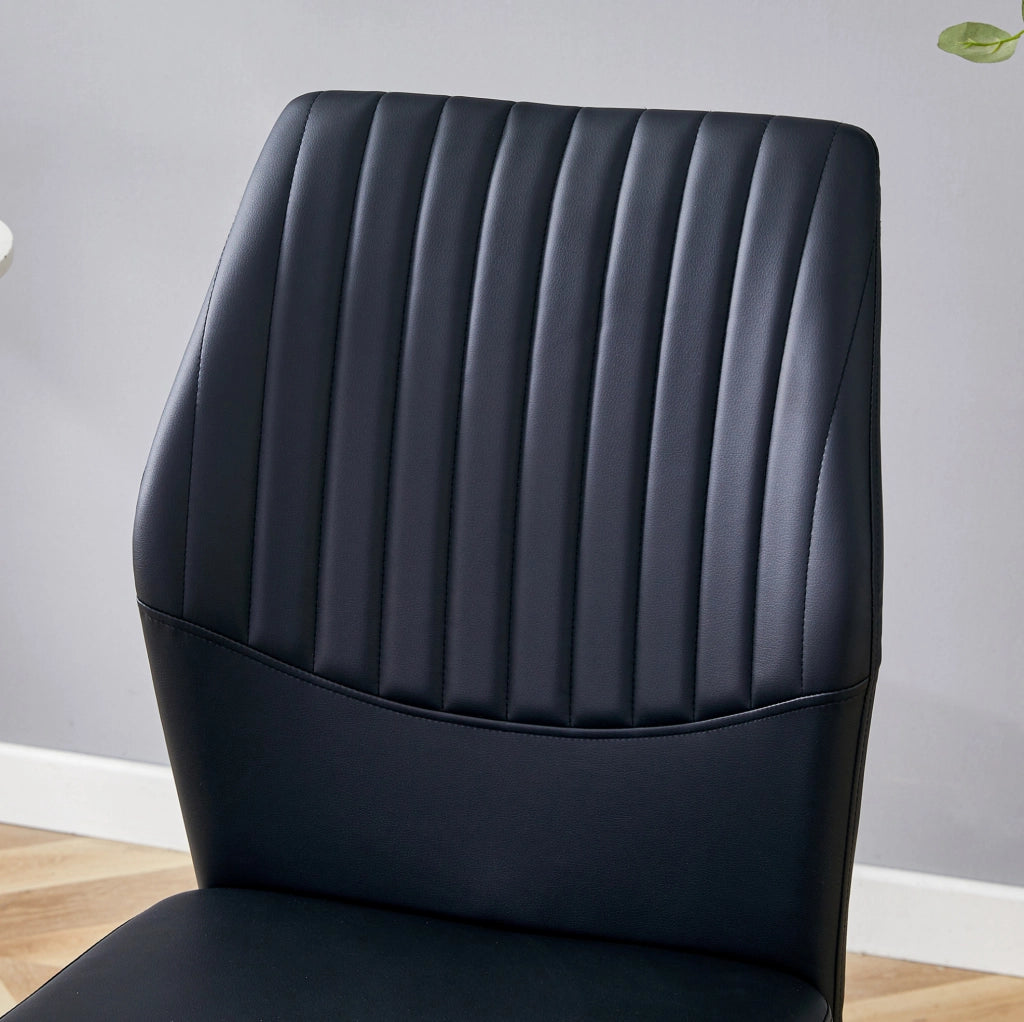Set di 4 sedie da pranzo nere e oro in PU con gambe in metallo