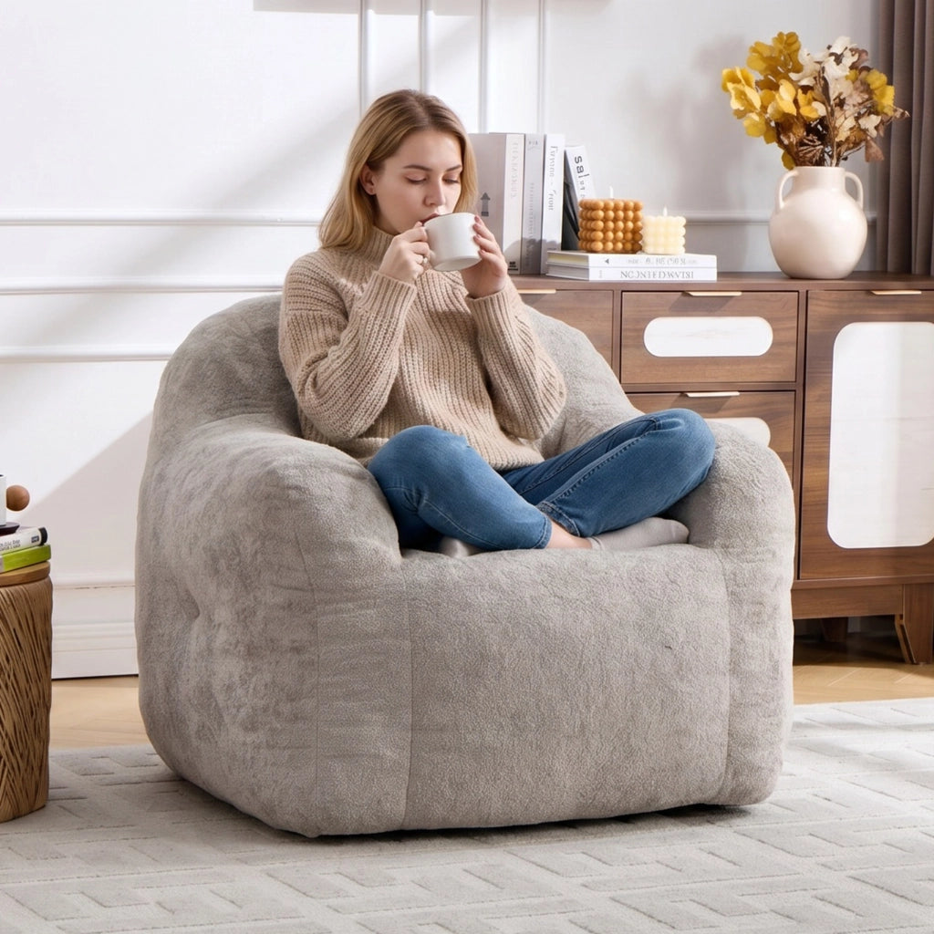 Pouf in pelliccia sintetica con braccioli e imbottitura in schiuma sminuzzata, senza montaggio, grigio chiaro
