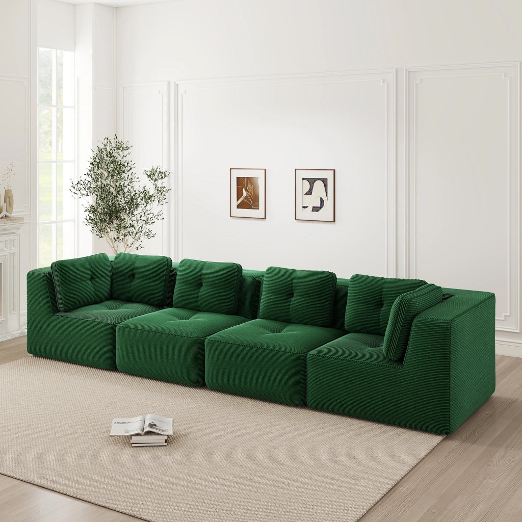 Divano angolare modulare senza montaggio con moduli flessibili seduta profonda e braccioli in velluto a coste verde