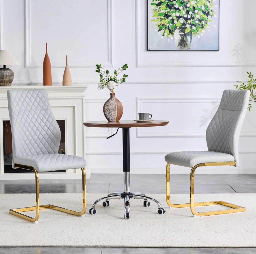 Set di 2 sedie da pranzo in PU grigio chiaro con schienale alto; struttura in metallo oro