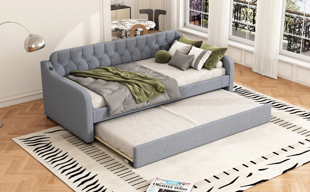 Divano letto grigio 90x200 cm con letto estraibile e porta USB