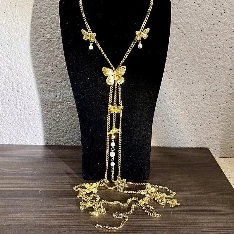 Collana fatta a mano con farfalla, nappa e perle, regalo di Natale o di compleanno.