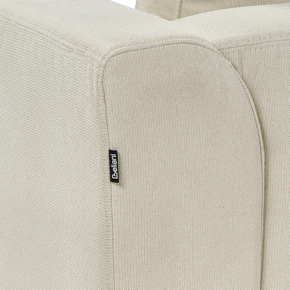 Divano ad angolo rivestito in tessuto beige a forma di L con orientamento a versione destra