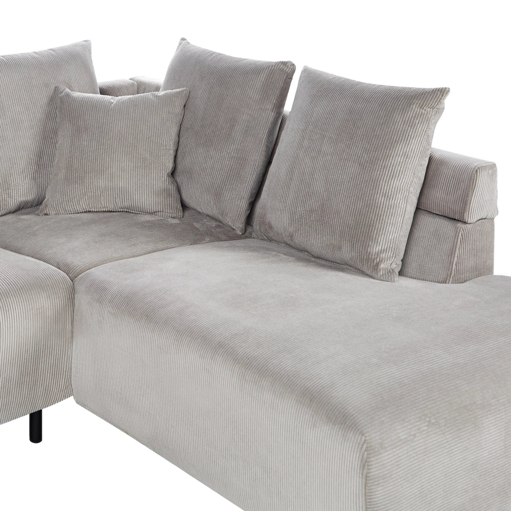 Divano ad angolo in velluto a coste grigio chiaro e gambe in metallo design retrò stile moderno