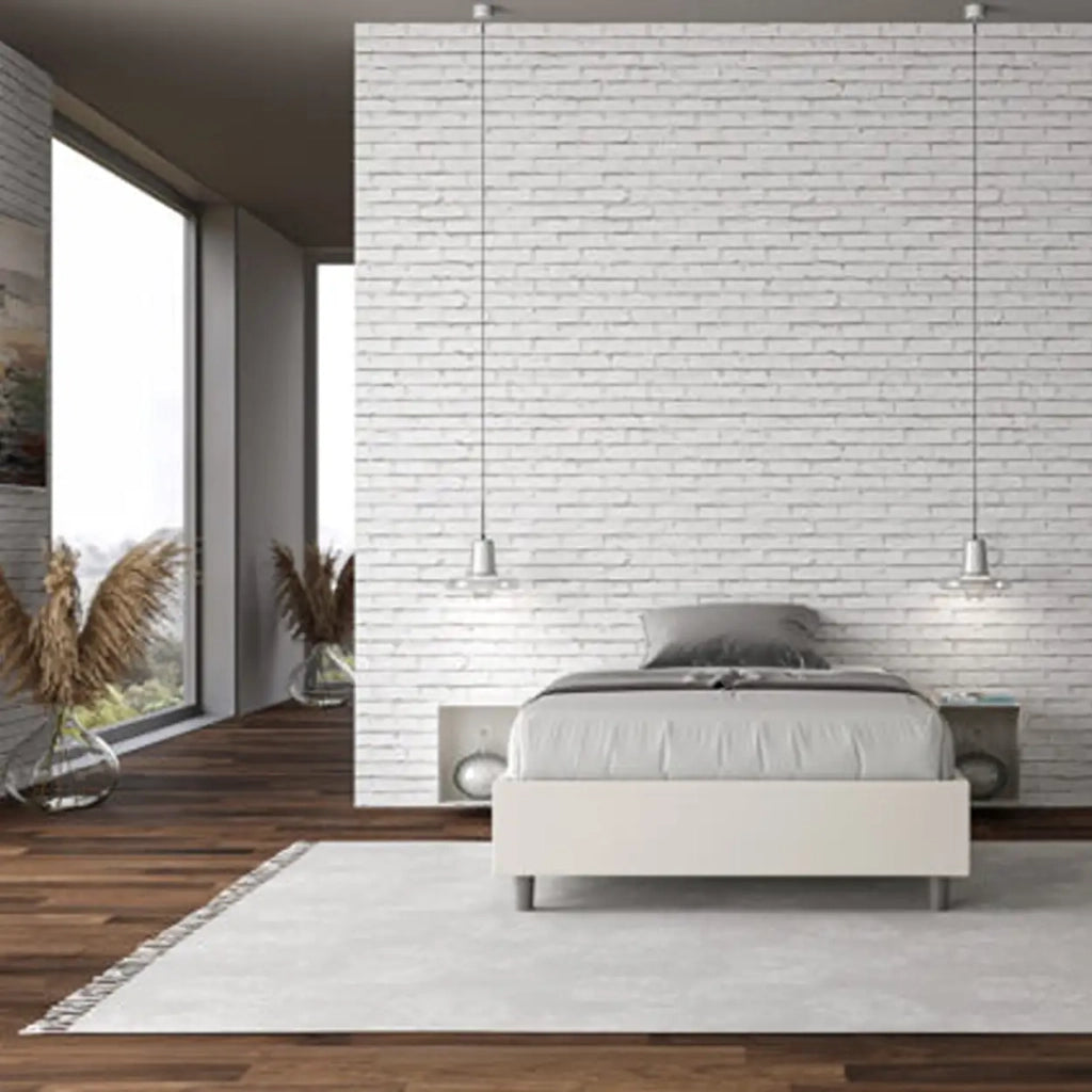 Letto una piazza e mezza contenitore imbottito 120x190 similpelle bianco Azelia