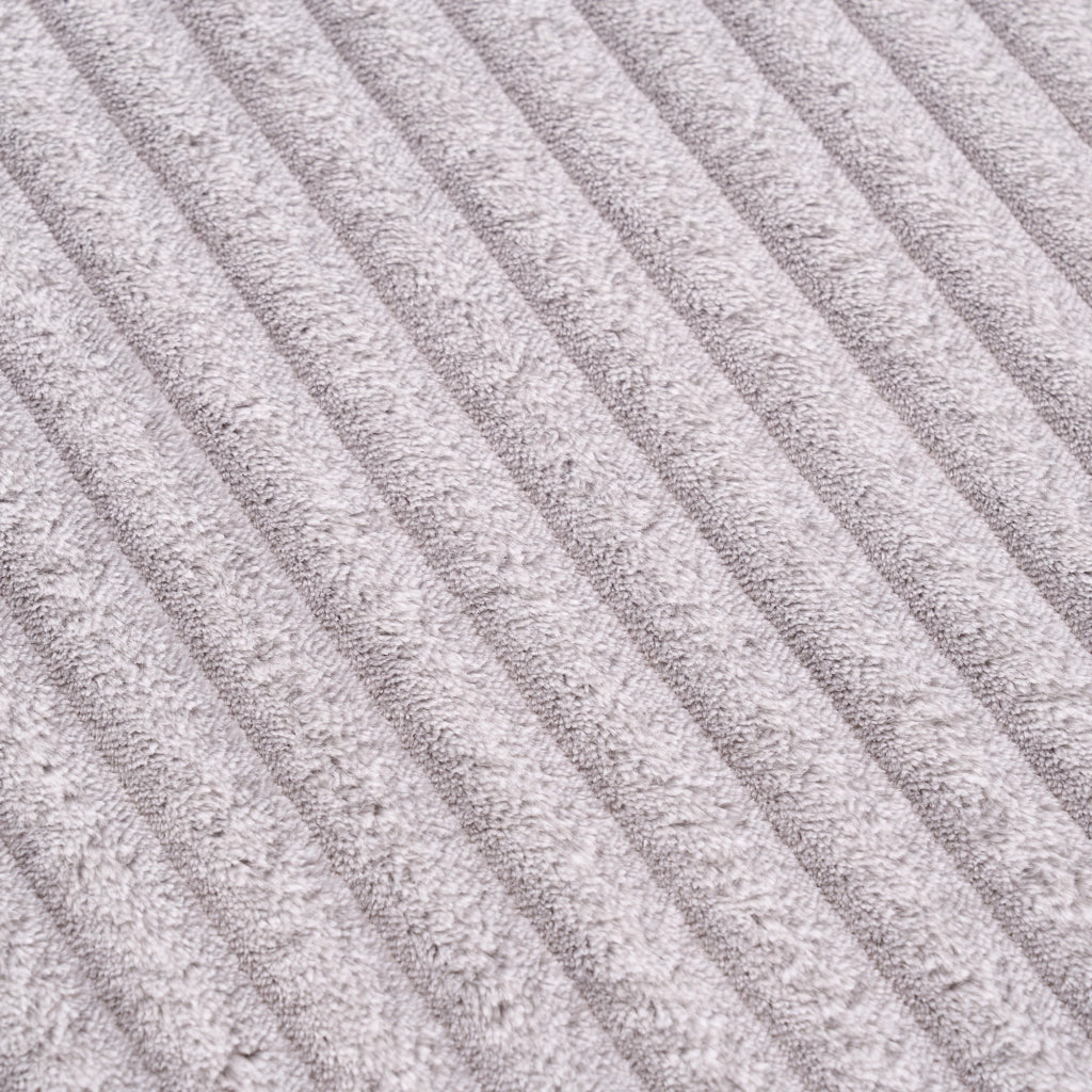 Divano angolare modulare senza attrezzi con chaise longue e seduta oversize per salotto in tessuto chenille grigio