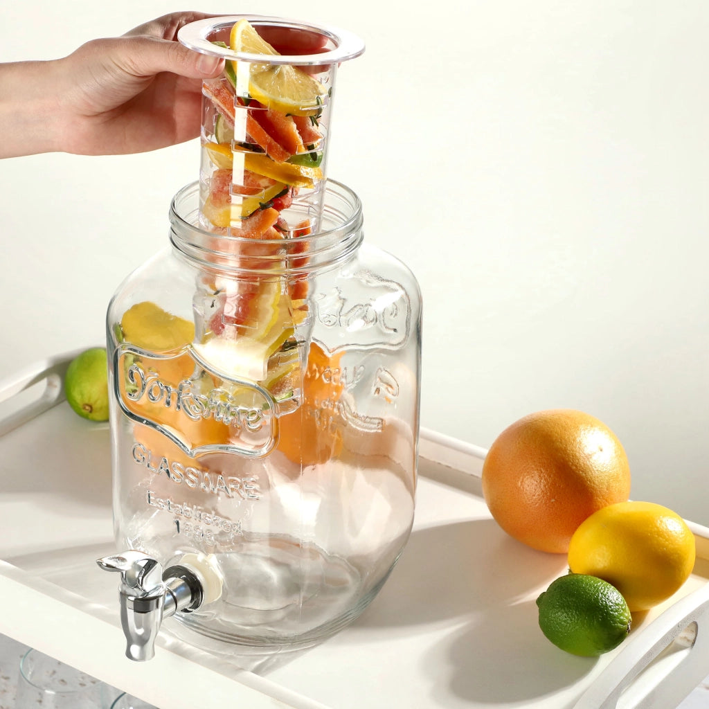 Barattolo KADAX con rubinetto da 4 litri in vetro con inserto per bevande come acqua, limonata e succo di frutta.