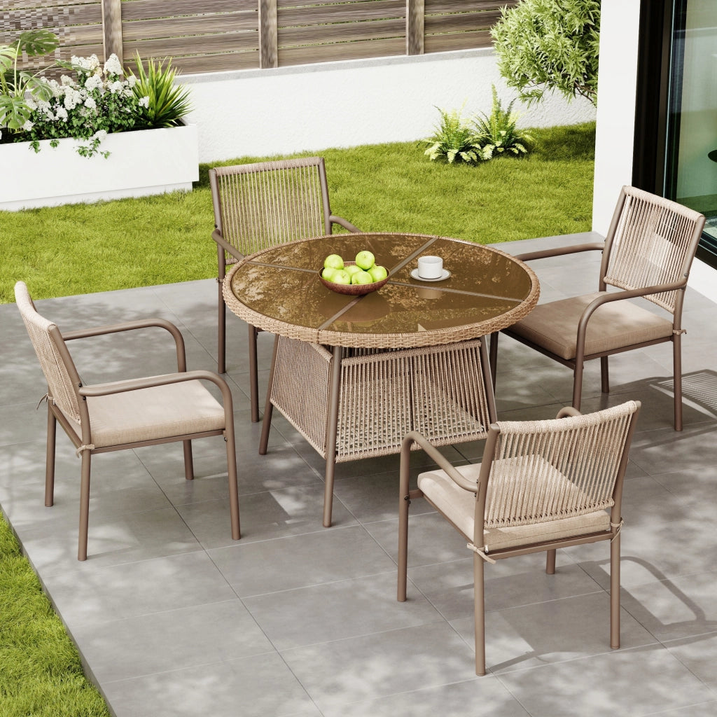 Set salotto polirattan: tavolo rotondo vetro + 4 poltrone; struttura ferro; terrazzo/balcone