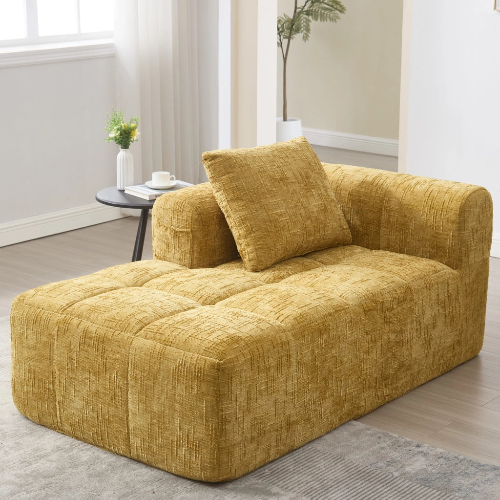 Divano chaise longue giallo in ciniglia con tasche laterali