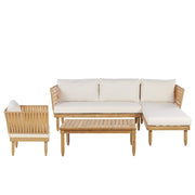 Salotto da esterno in legno di acacia con cuscini bianco sporco e tavolino da caffè con poltrona in finto rattan