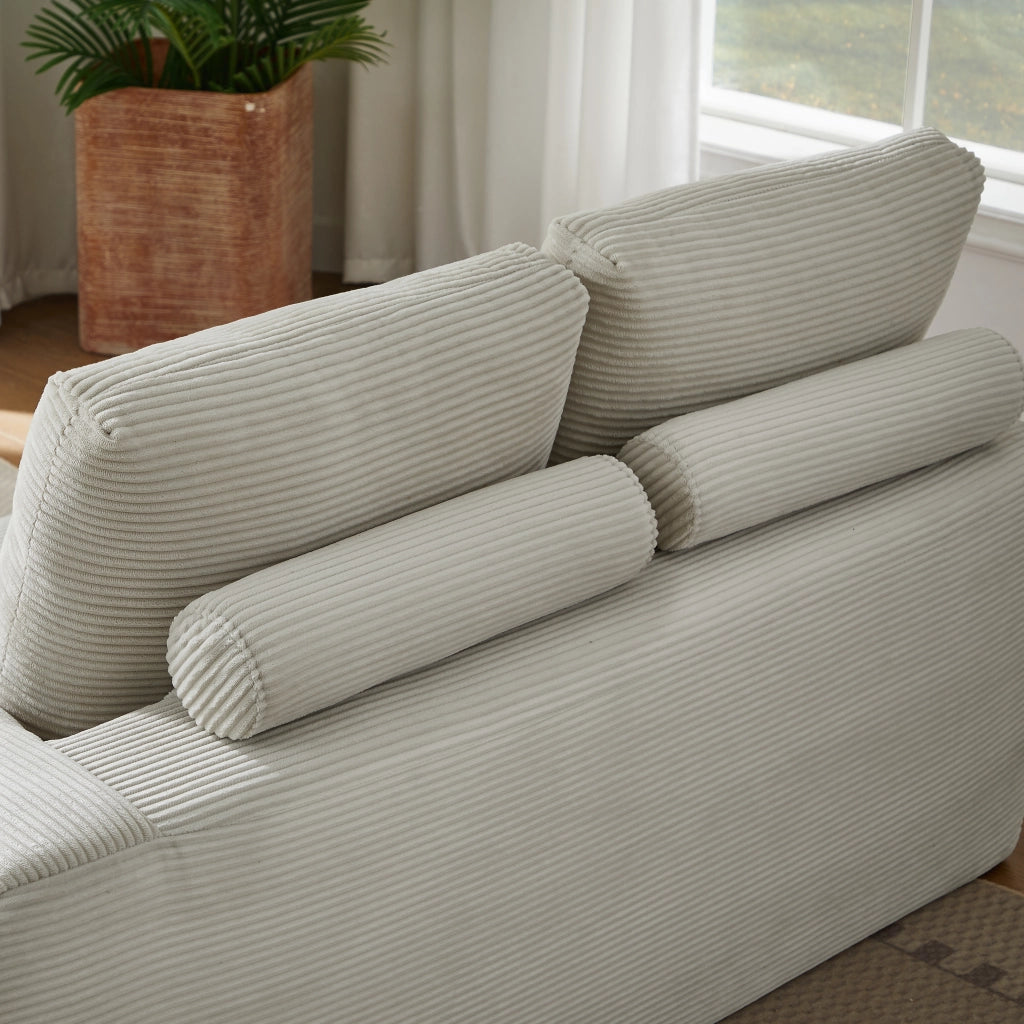 Divano angolare modulare con design segmentato e supporto in velluto a coste beige
