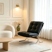 Poltrona con rivestimento rimovibile e gambe in cromo nero