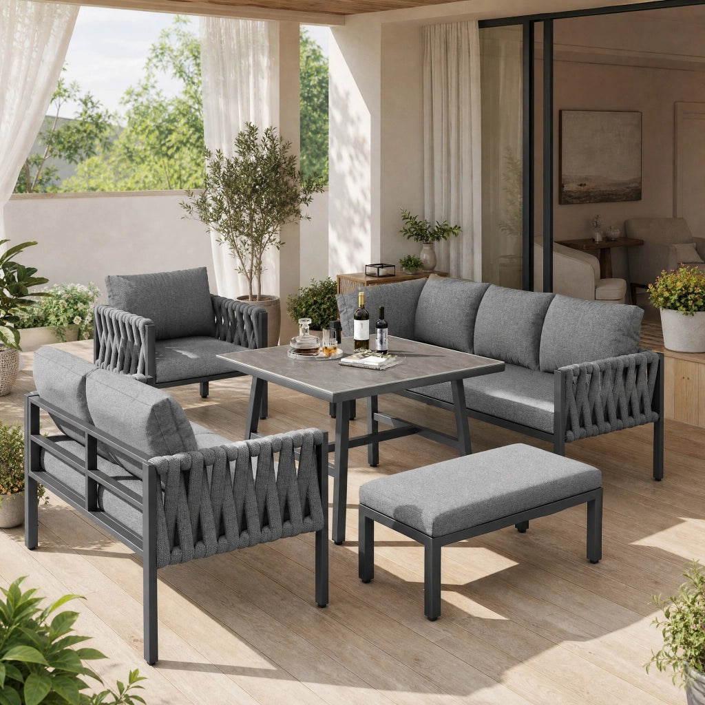 Set mobili da giardino angolare in metallo grigio con tavolino in vetro temperato e cuscini