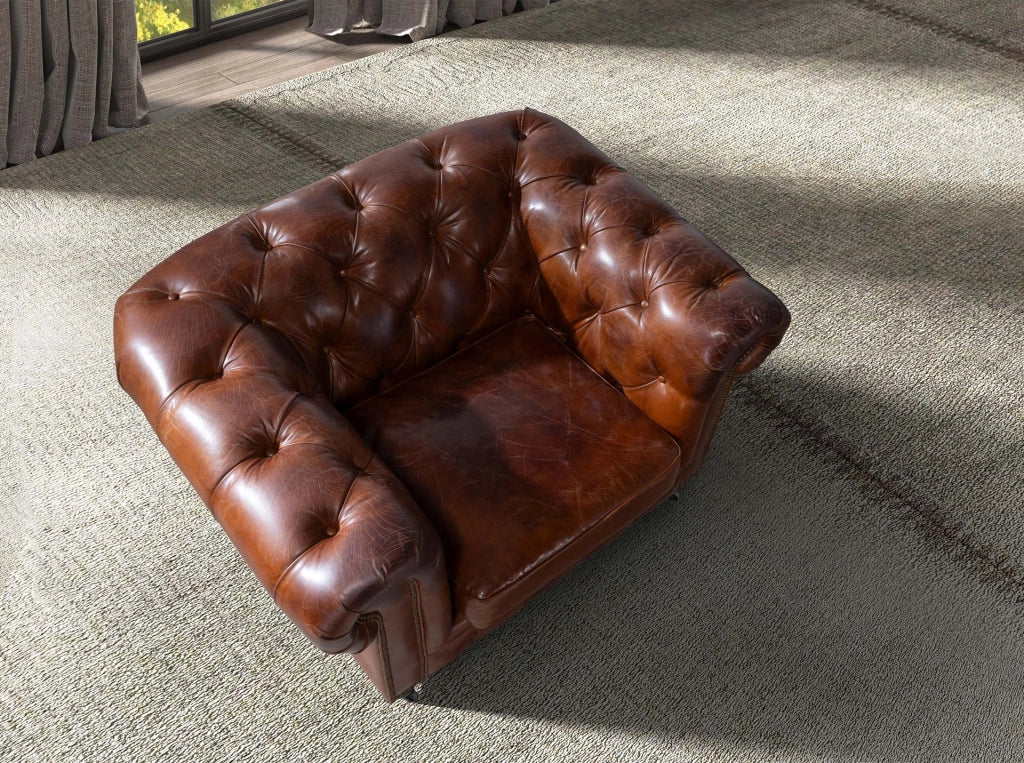 Poltrona Chester in pelle marrone cognac