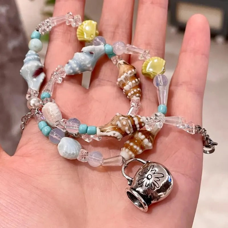 Collana fatta a mano con conchiglie e perline: ciondolo a forma di clavicola in stile spiaggia