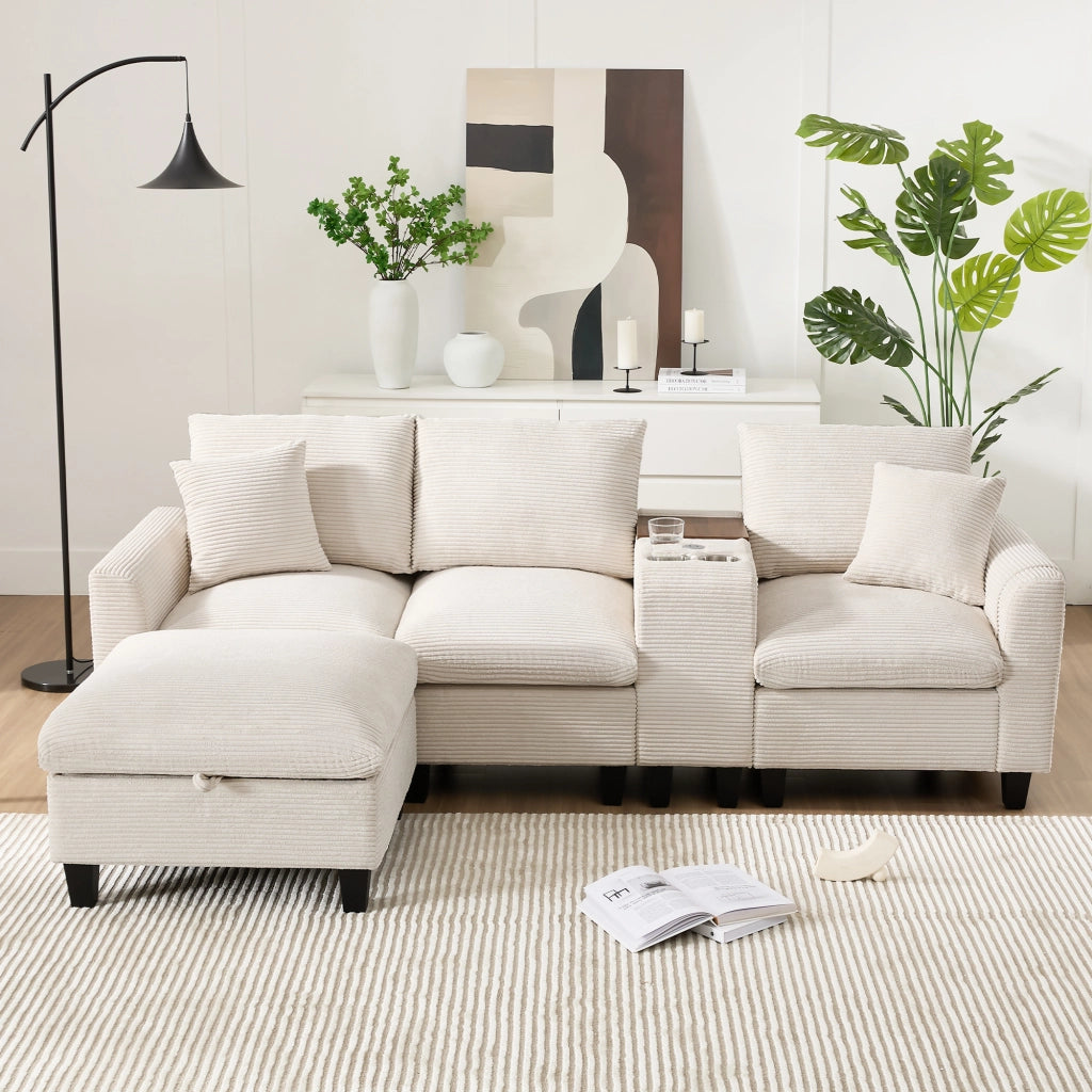 Divano angolare modulare con console centrale USB portabicchieri tasche laterali e cuscini in velluto a coste beige