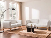 Set da salotto in stile scandinavo con divani a 2 e 3 posti, gambe affusolate in legno e rivestimento in bouclé bianco