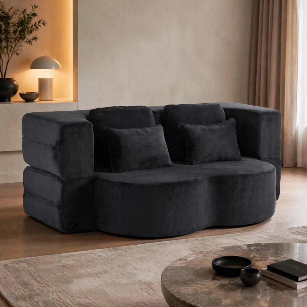 DIVANO LETTO in tessuto nero con 4 cuscini