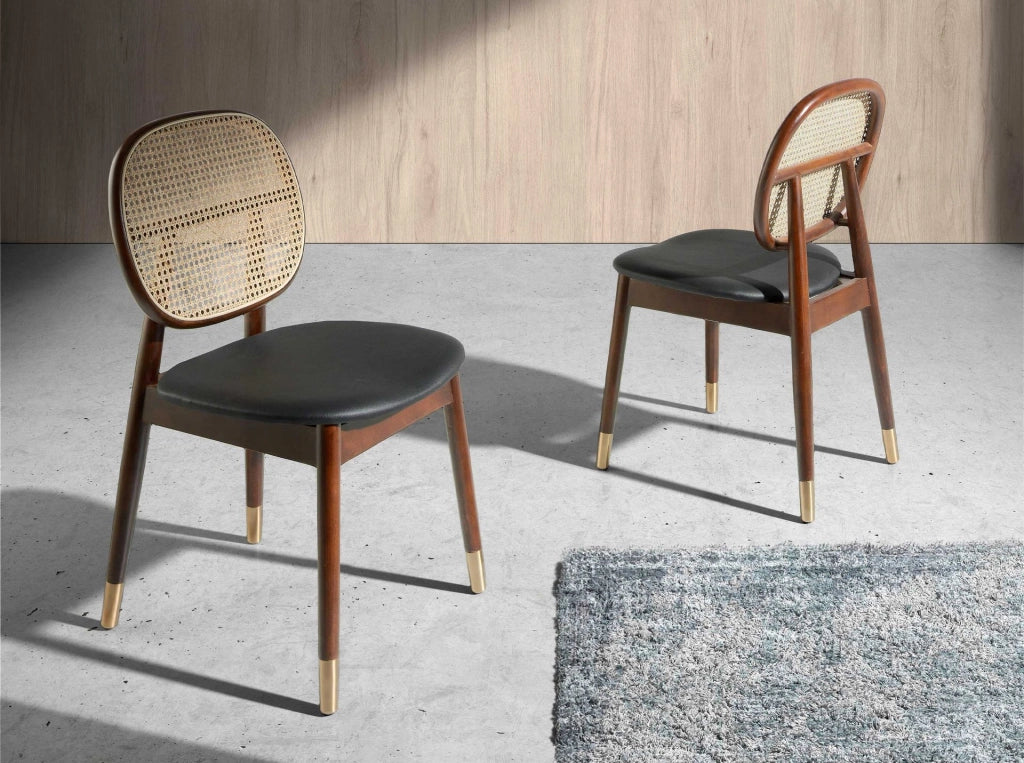 Sedia in rattan ed ecopelle nera