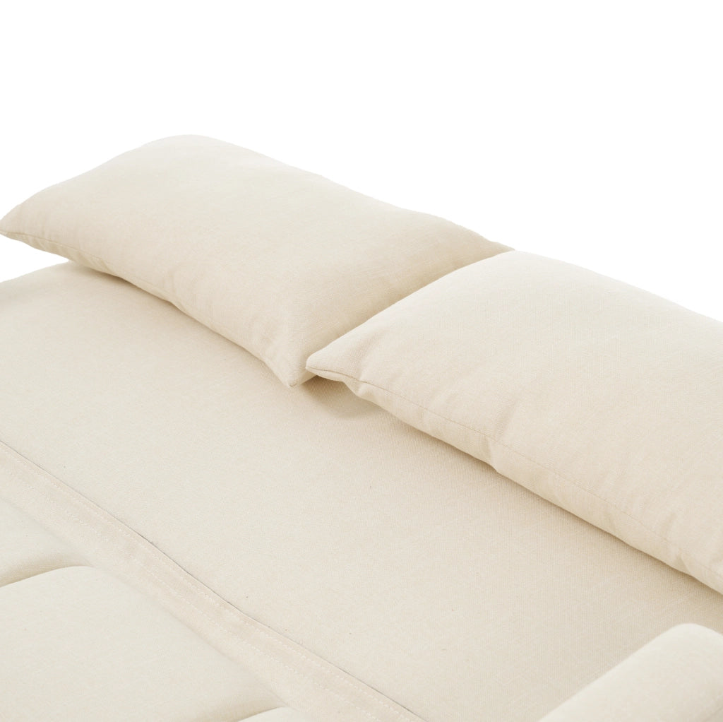 Divano letto pieghevole beige con schienale regolabile e due cuscini per ambienti compatti