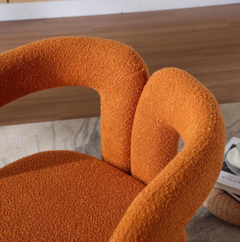Poltrona girevole 360° in bouclé arancione; 67x55x74 cm; con base in metallo