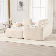 Sofa modulare 253x158x61 cm con sistema DIY; tasche laterali e portabevande in cord beige