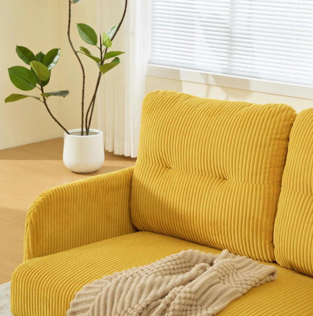 Divano tre posti in velluto a coste giallo con schienale ergonomico e tasca laterale pratica