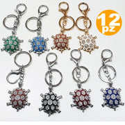Trade Shop - Set 12 Bomboniere Tartaruga Colorata 18 Anni Compleanno Glitter Porta Chiavi -