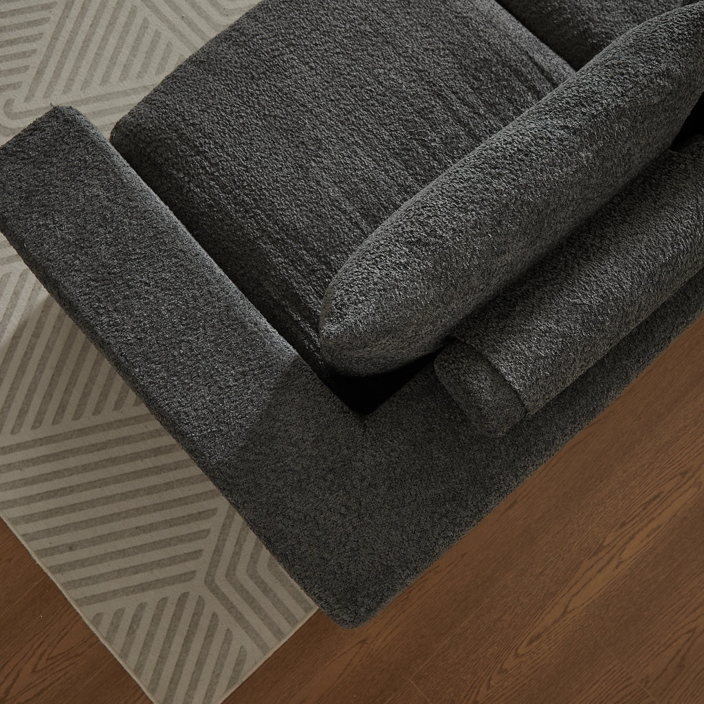 Divano componibile a L con chaise longue in chenille grigio con cuscini, supporto in ferro e moduli reversibili