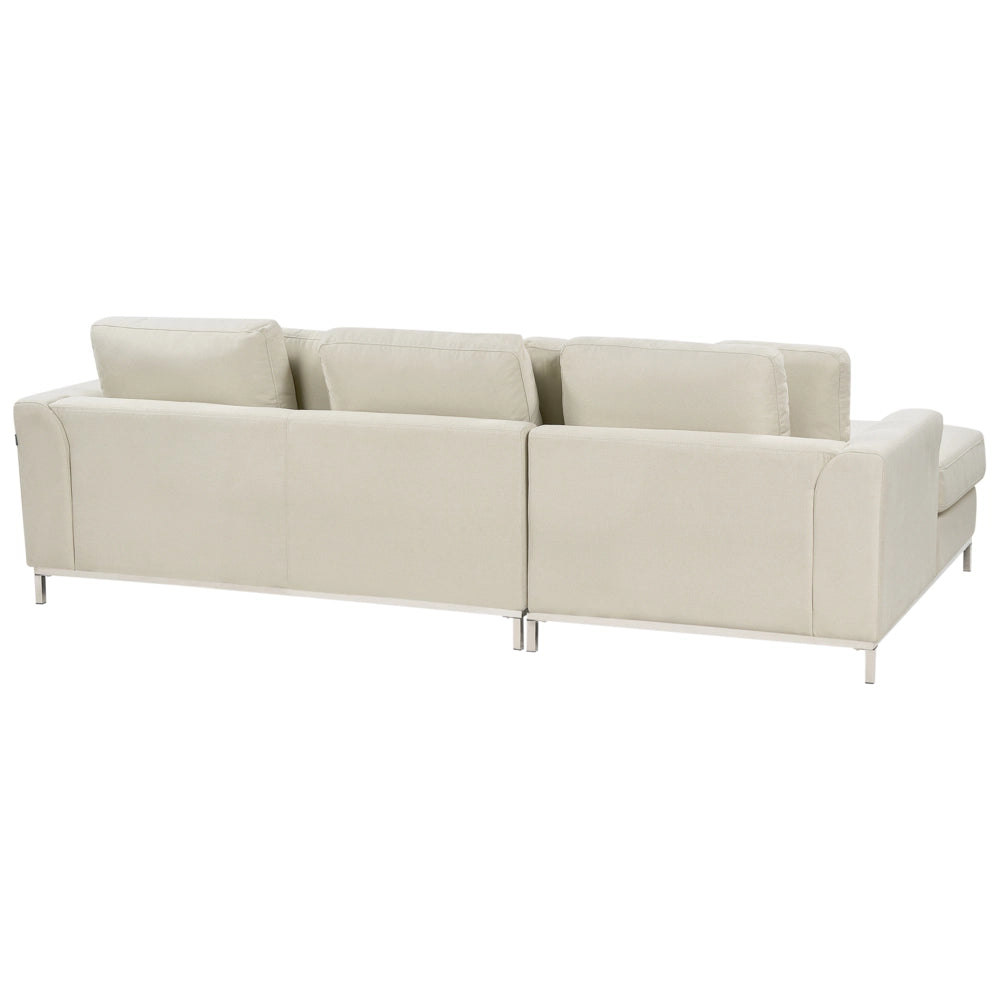 Divano ad angolo rivestito in tessuto beige a forma di L con orientamento a versione destra