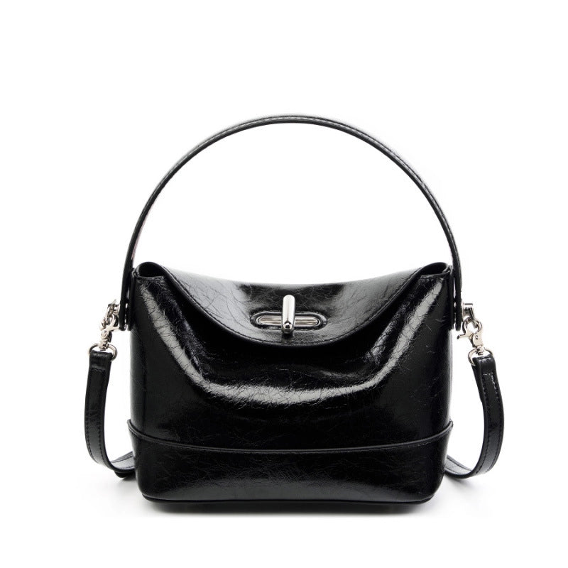 Borsa a mano e borsetta da donna in vera pelle, nera.
