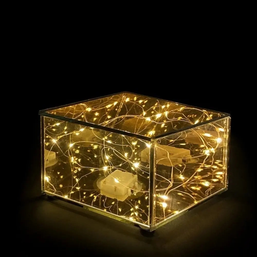 Alzata natalizia in vetro colore oro con led h10,5cm
