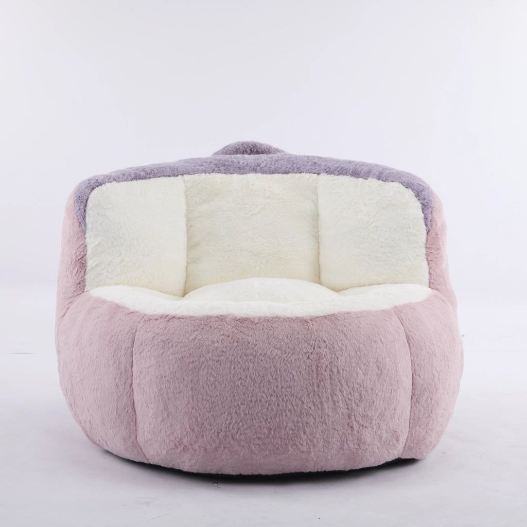 Poltrona pouf con imbottitura in schiuma sminuzzata e base antiscivolo in pelliccia sintetica multicolore