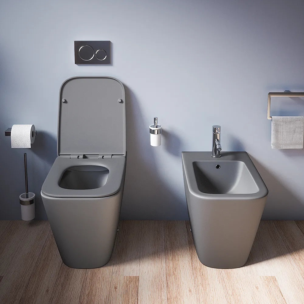 Coppia sanitari in ceramica filomuro vaso rimless, bidet e copri-wc grigio opaco | Kyoto