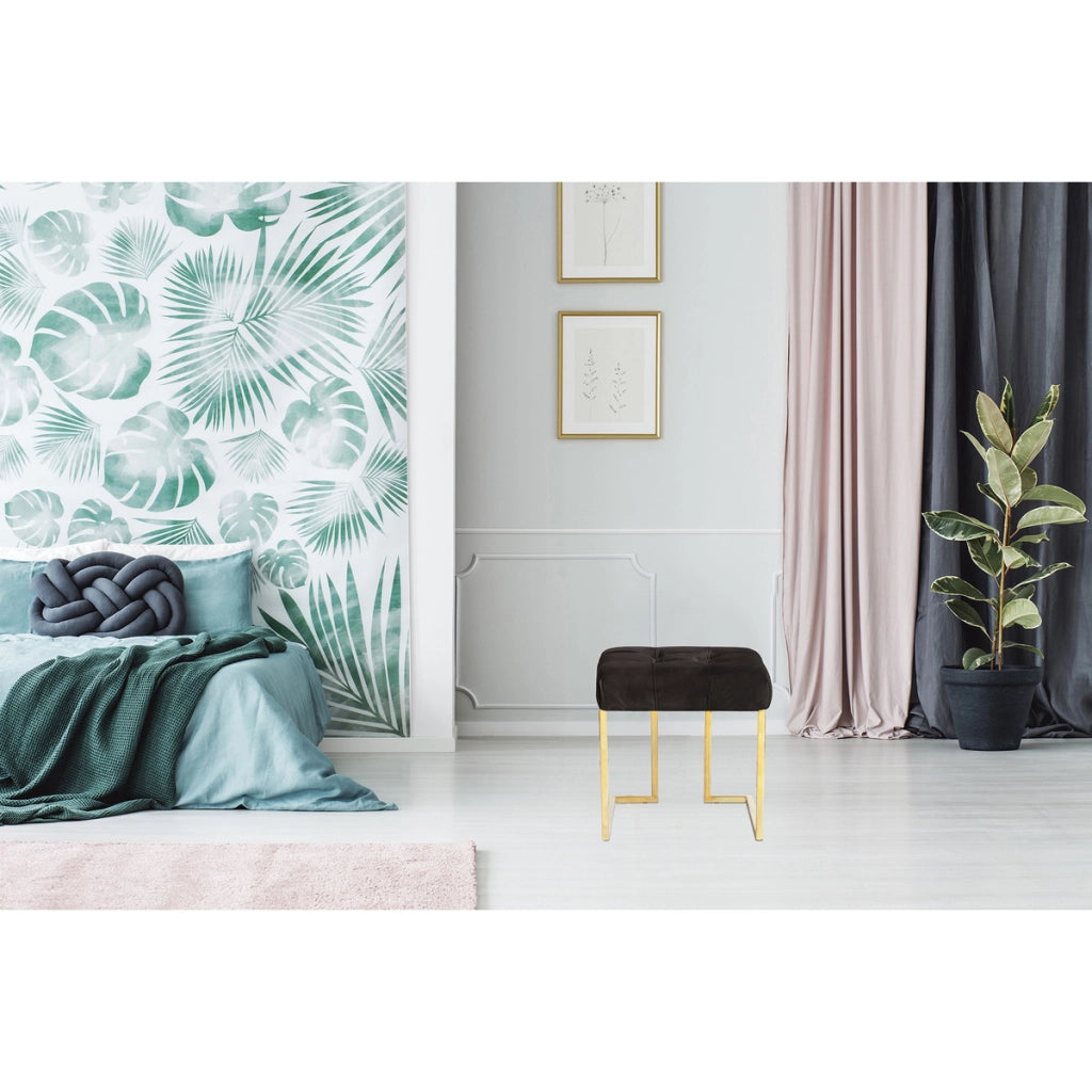 Pouf Rarity in velluto nero con base in acciaio dorato