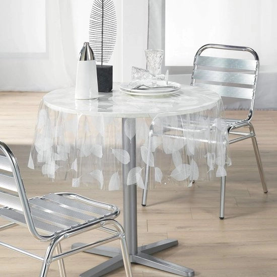 Tavolo con tovaglia in PVC cristallo a rilievo 140 cm con tessuto 14/100 con disegno bianco