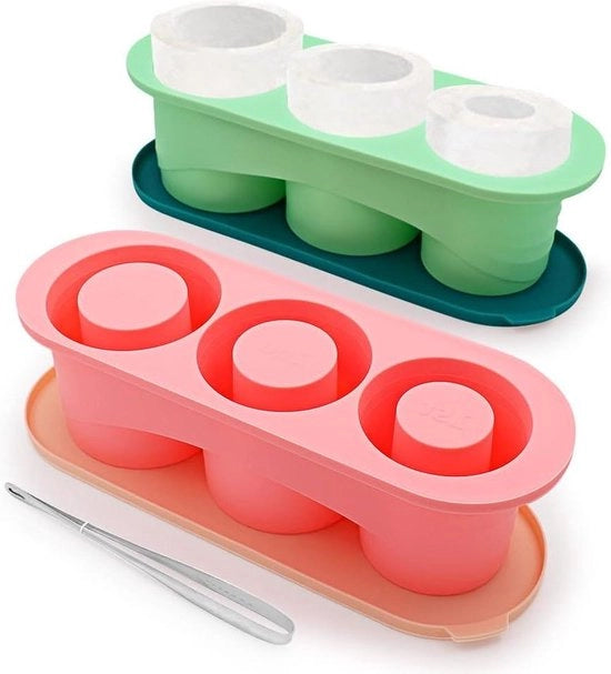 Set di due cilindri in forma di cubetto di ghiaccio con coperchio - verde e rosa - ideale per cocktail