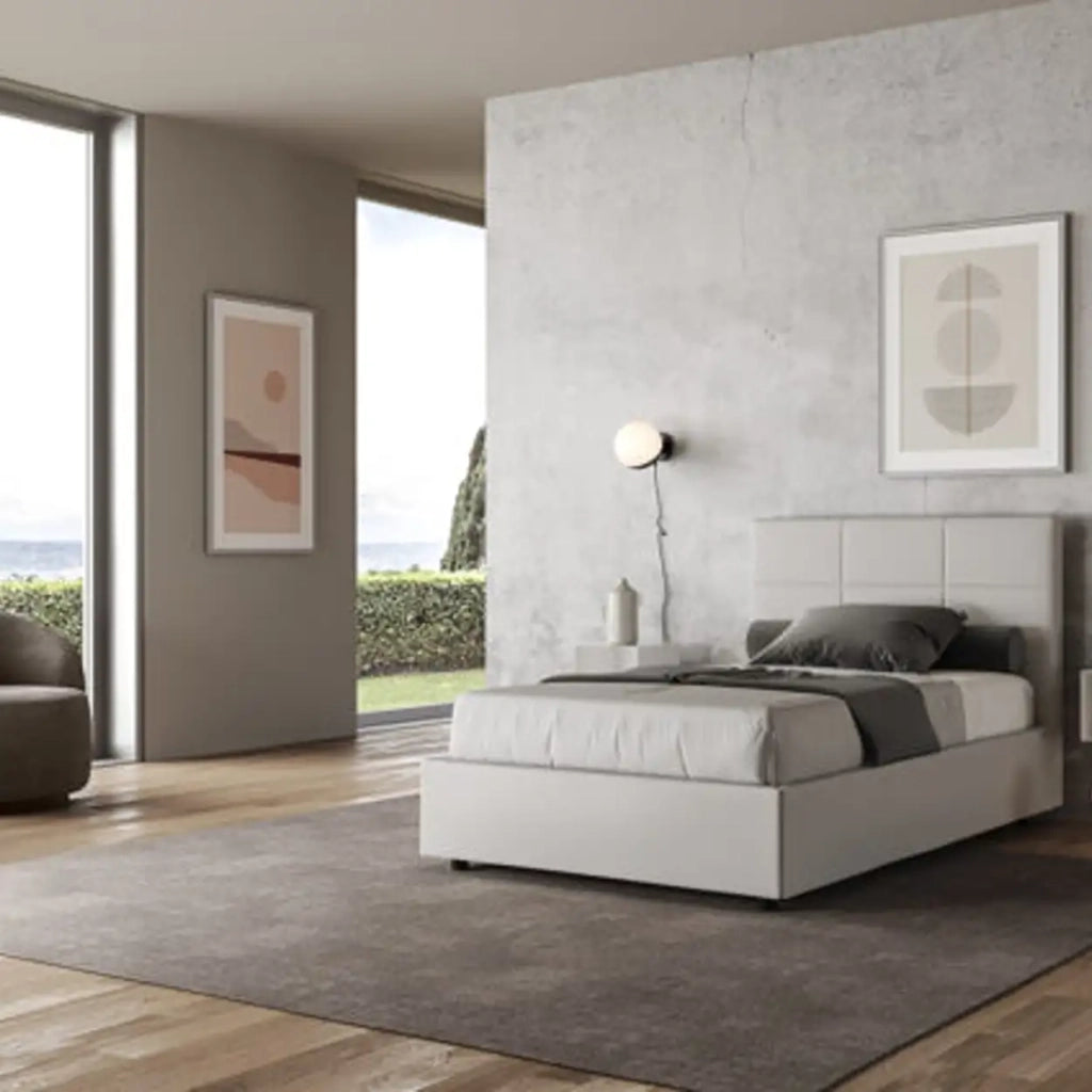 Letto una piazza e mezza con rete imbottito 120x190 similpelle bianco Mika