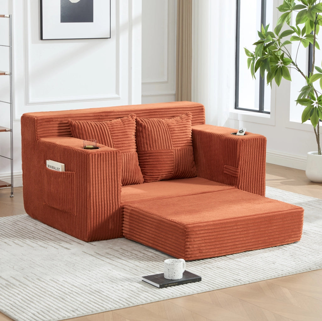 Divano pouf in velluto a coste arancione con tasche laterali e 2 cuscini; 151 x 133 x 64 cm