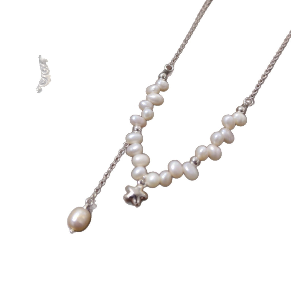 Collana barocca con perle d'acqua dolce naturali e nappe