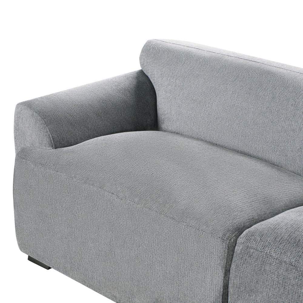 Divano in tessuto grigio 3 posti con cuscini aggiuntivi stile moderno