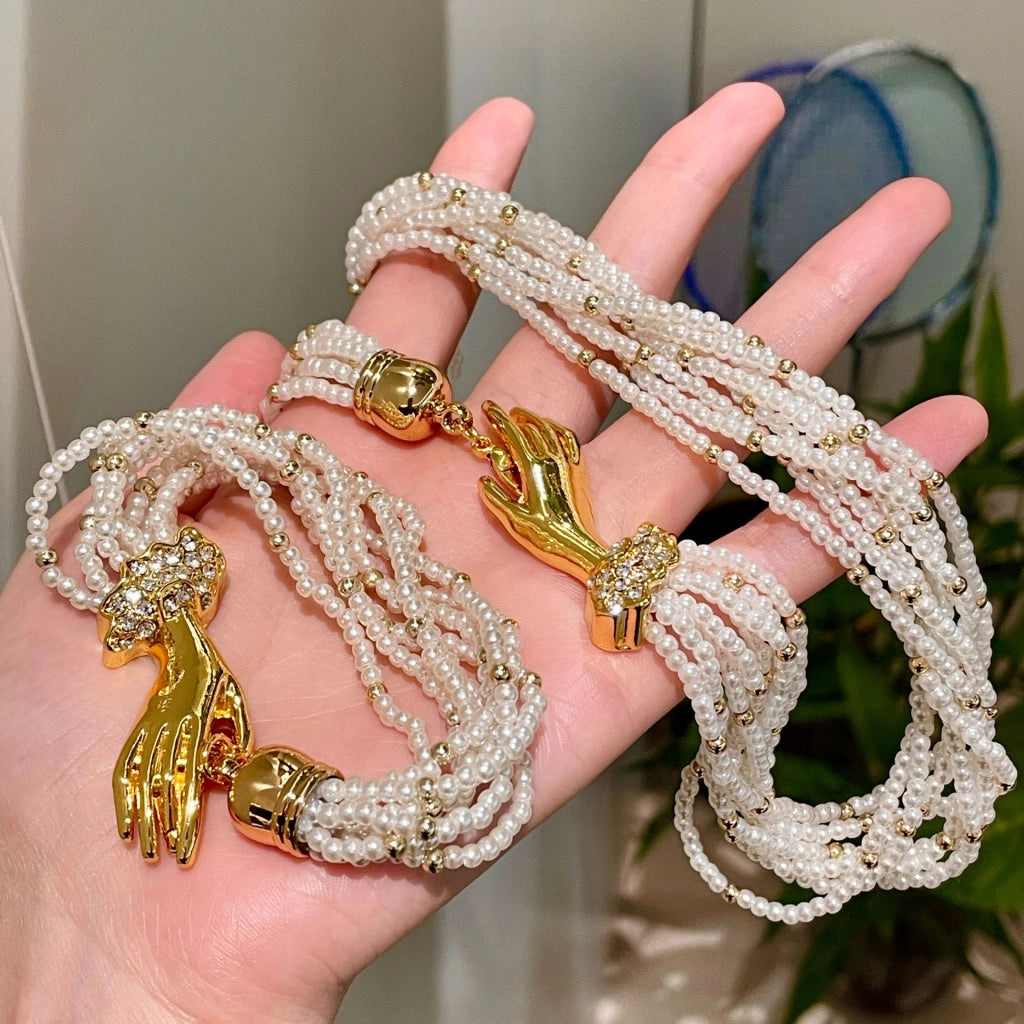 Collana retr¨° a pi¨´ strati con perle in stile Hepburn, elegante bracciale a pi¨´ strati con motivo a palma