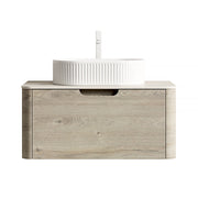 Mobile bagno sospeso con lavabo ovale in ceramica e 1 cassetto soft close; top in pietra sinterizzata per bagno