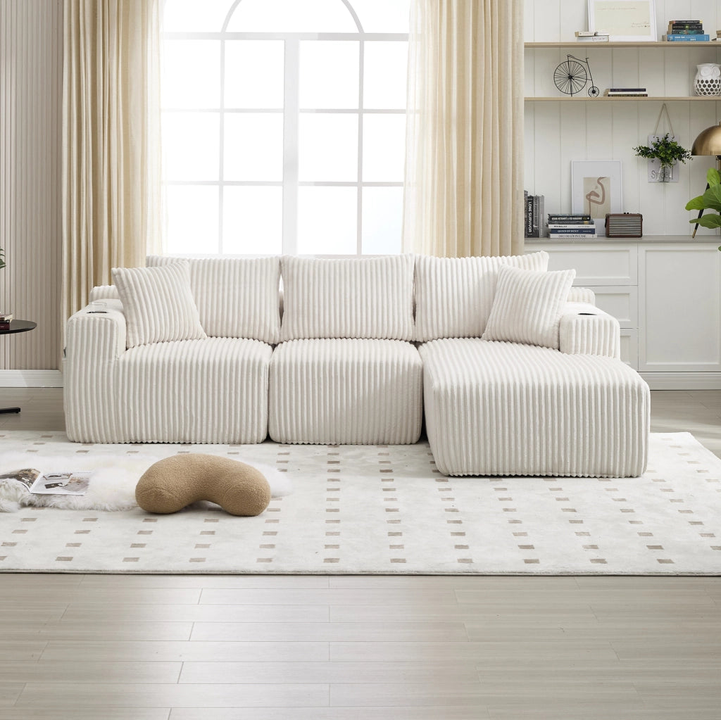 Divano modulare 257x160x62 cm con 5 cuscini; tasche laterali e portabicchieri in corduroy beige