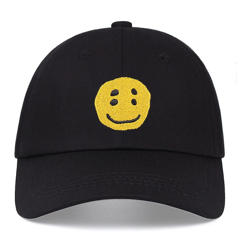 Cappellini da baseball neri in cotone con divertente faccina sorridente ricamata.