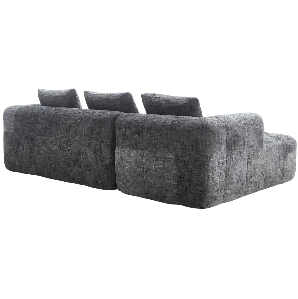 Divano componibile grigio in ciniglia con chaise longue e tasche